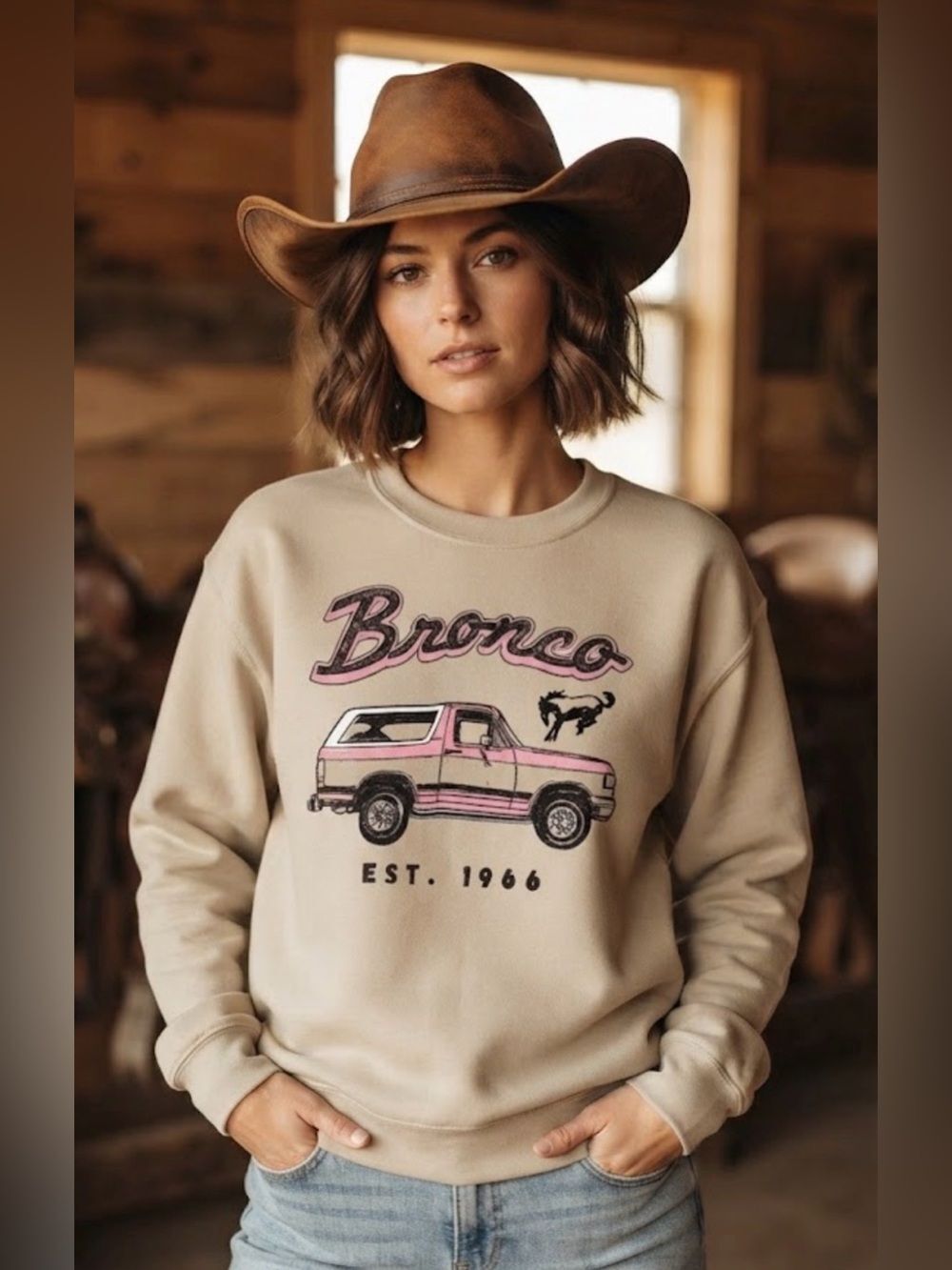 Junk Food Clothing Beige Crewneck with Pink Bronco Graphic Sweatshirt